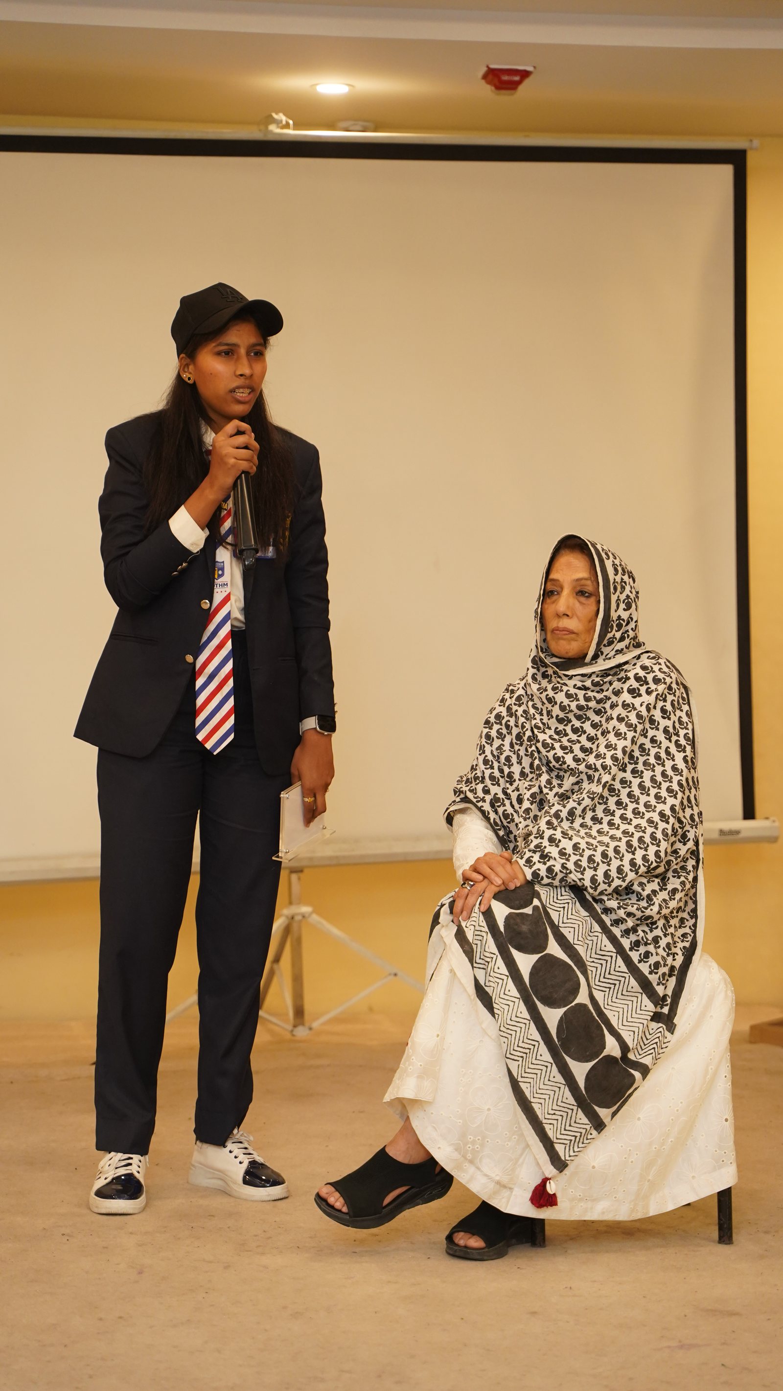 A student receiving recognition at Rukh Foundation