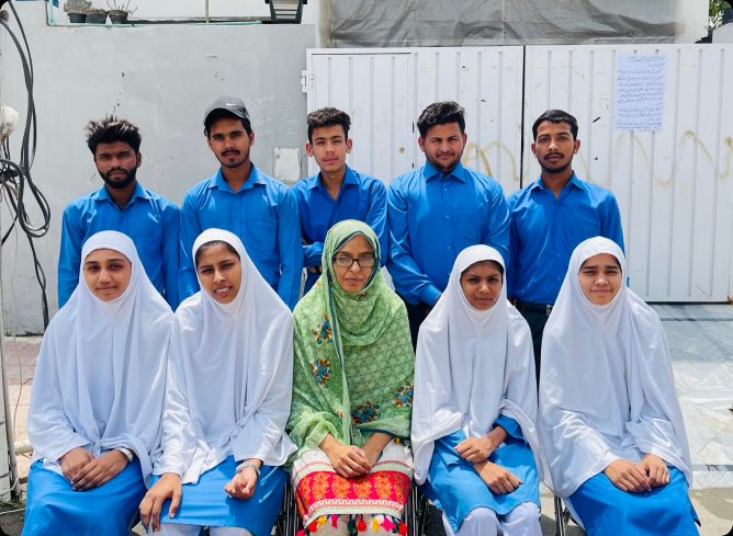 Grade 10 students with the school principal