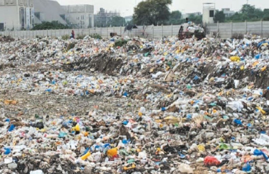 Waste on a neighbourhood plot before it is reclaimed