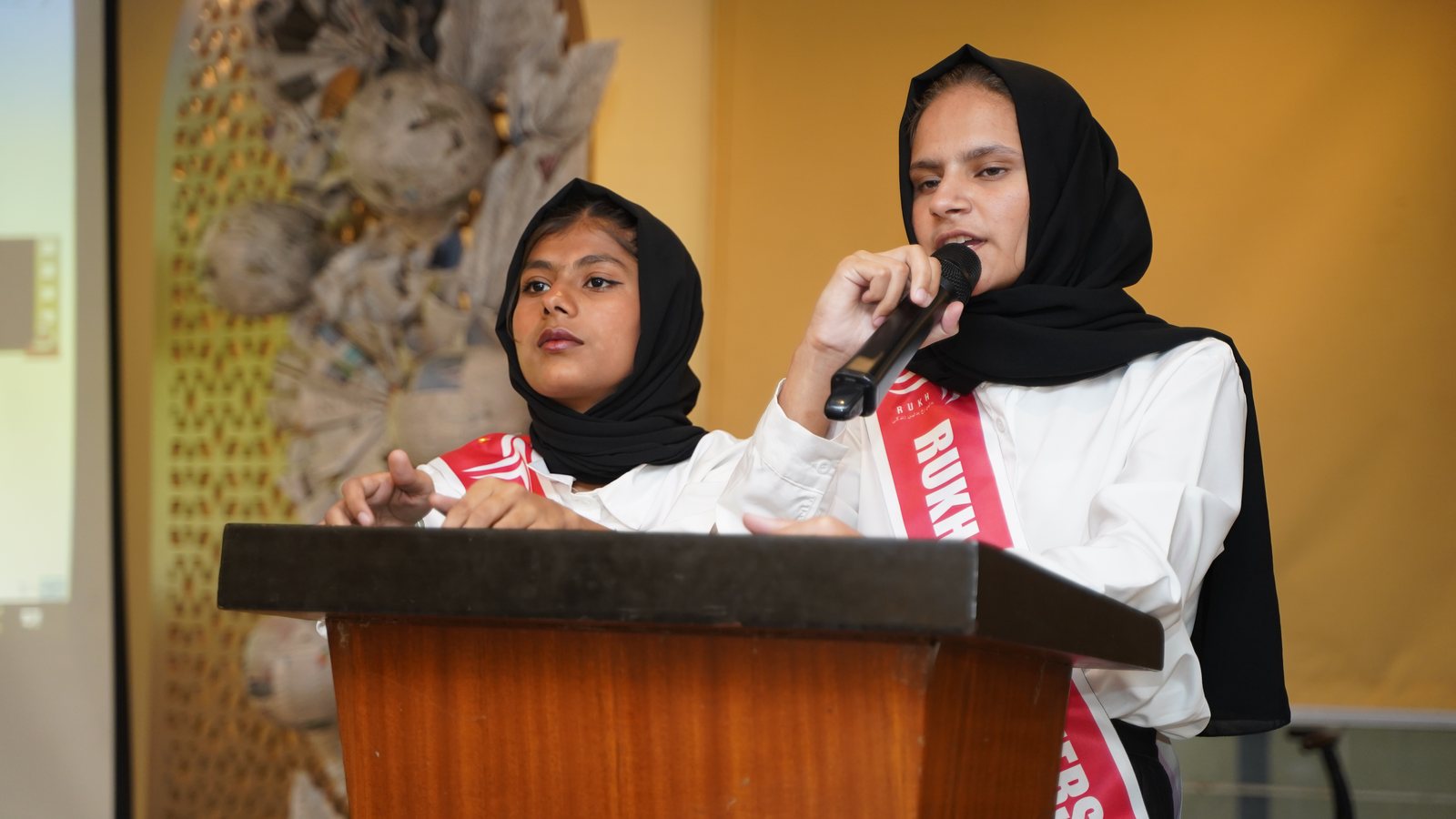 A student speaking at a Rukh Foundation event